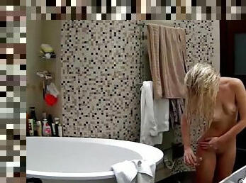 Voyeur camera shoots chicks in their bathrooms