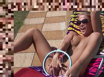 Young perky tits blonde teen gets wet by the pool outdoors