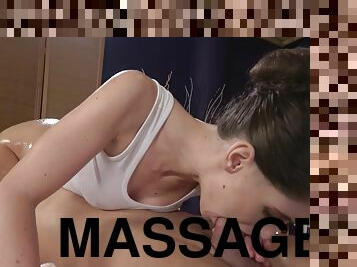 Masseuse 69s client's cock and takes it from the side on the massage table