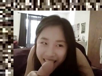 Asian cutie sucking dick