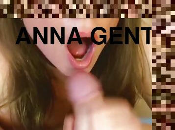 Anna gently caresses his swollen cock with her tongue