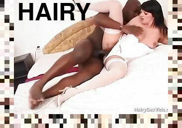 Hairy mom getting stuffed by a black guy