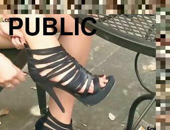 Barefoot redhead shows off cute feet in public
