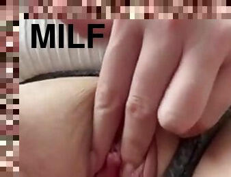 Hot milf fingering pussy in her car in public