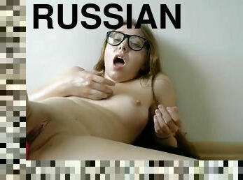 Nerdy Russian babe has an orgasm on webcam