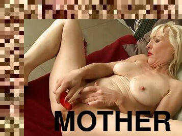 Grandmother bought a new red dildo and tried
