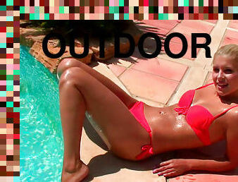 Brandy Smile is posing naked at the poolside