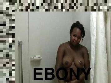 Sexy round ebony babe taking a sensual shower