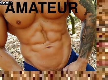 Muscular amateur tattooed stud jerks off dick outdoors solo