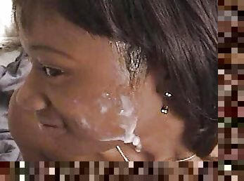 Pretty ebony gal gives nice head and gets a facial