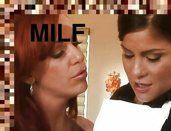 Sexy milf Shannon Kelly and Michelle Avanti in lesbian action.