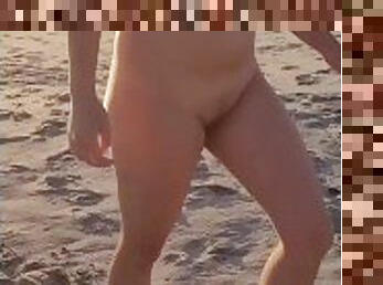 Caught in public walking naked on the beach