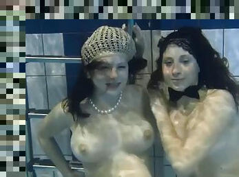 The sexiest girls underwater touch their tits