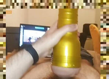 hairy young man silently cums after fucking fleshlight on bed while watching himself on cam