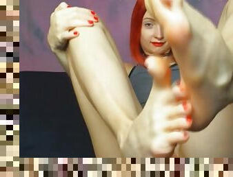 Amazing redhead model shows her soles & toes
