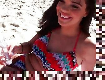 Cute amateur in bikini looks sexy on the beach