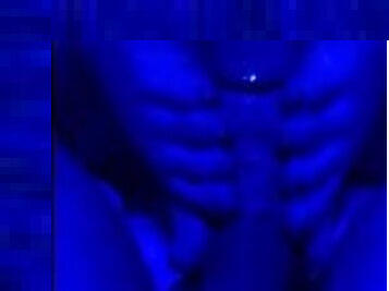 footjob under blue light with cum