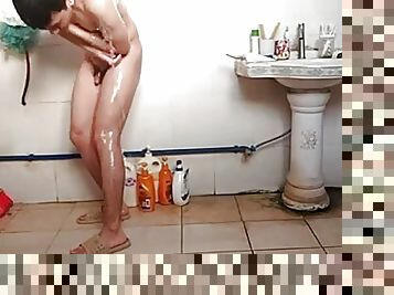 The fat stepbrother was secretly photographed taking a shower at home