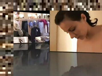 Hot german lesbians use a strapon in a changing room