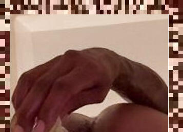 Tattooed man dildos hole in bathroom