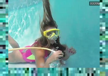 Cute teen Irina Float swims naked underwater