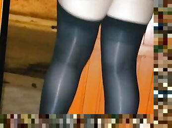 Exhibit in high heels and stockings