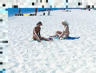 Ravishing nude beach girls tanning