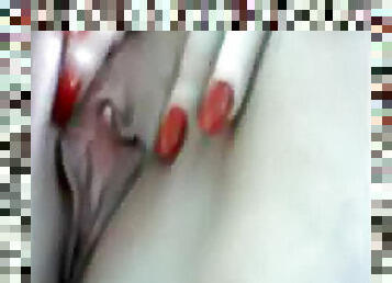 Sexy red fingernails on fingering girl