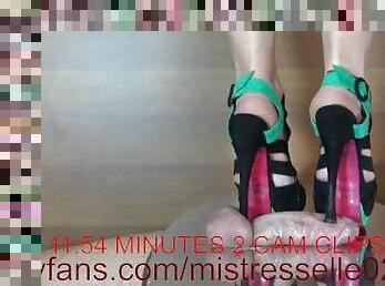 Mistress Elle crushes cock with her turquoise and black sandals