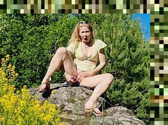 Horny Milf Masturbating In A Summer Dress On Top Of A Huge Rock In A Public Park At Midsummer