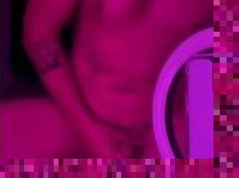 Guy fucks dildo in mirror while rolling on molly blacklight
