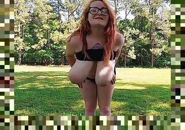 Huge Titted Redhead in Public Park