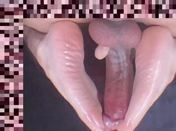 Masturbation with oiled feet and cock