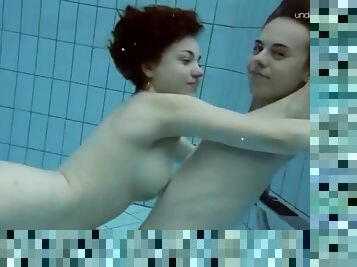 Nude girls filmed swimming underwater