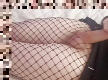 Femboy Shakes and Cums in Skirt and Fishnets