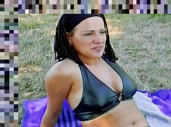 Dark haired slut from Germany fucks a hard cock outdoors