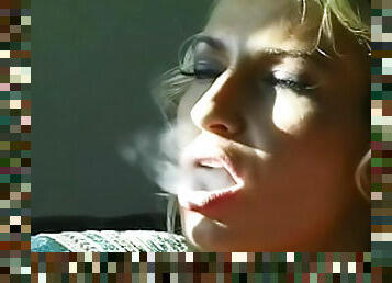 Blonde is smoking a cigarette so sexy