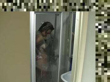 Get a peep of my girl&#039;s hot naked body as she showers in the bathroom