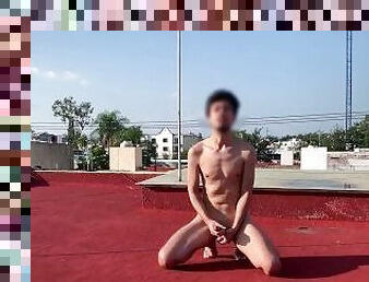 Skinny guy masturbating in the rooftop in the middle of the day