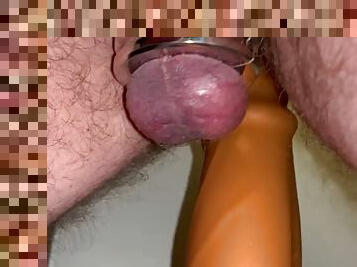 A huge thick monster dildo going deeper into my ass than ever before with lots of moans and groans as it goes deeper.